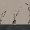 Three Different Ceramic Vases With Bonsai Plants On Dark Wooden Table Light Background