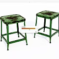 Two Green Metal Distressed Stools With Square Worn Surface And Sturdy Rustic Design 3d model