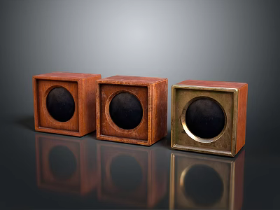 Three Square Wooden And Metal Speakers With Circular Drivers On Reflective Surface 3d model