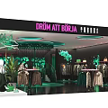 Stylish Fashion Clothing Store Interior With Green Lighting Clothing Displays And Decorative Backdrops