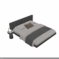 Modern Double Bed With Leather Headboard Soft Pillows Gray Blanket And Black Nightstand Table Lamp