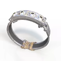 Silver Ornate Bracelet With Gold Accents Circular Holes And Clasp
