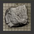 Natural Wood Stone Material With Rough Surface On Grid Pattern Mat