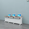 Office Work Desks With Wooden Tops White Cabinets And Laptops Against Light Blue Wall
