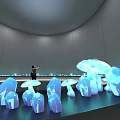 Art Installation In Circular Gallery With Gray Walls Blue Light Spots Black Floor And Person Photographing