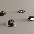 Black Round Lighting Fixtures with Different Patterns and Illuminated Details on Gray Surface