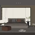 Modern Minimalist Beige Bedroom Featuring Wooden King Bed Nightstand Lamp Chair Rug And Bookshelf