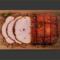 Sliced Roasted Ham on Wooden Cutting Board with Rosemary and Black Pepper