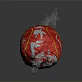 Lindt Lindo Red Candy With White Leaf Pattern On Crinkled Wrapper Against Black Background