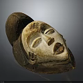 Traditional Wooden Mask With Carved Human Face Features And Intricate Hair Details
