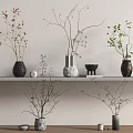 Minimalist Modern Shelf Display Featuring Multiple Vases With Branches And Fresh Plants In Neutral Tones
