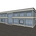 Modern Two Story Office Building Exterior With Large Windows And Glass Doors