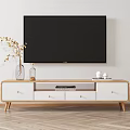Modern Wooden White TV Stand With Vase Flower Branches And Decorations In Living Room