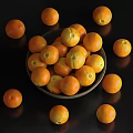 Fresh Oranges In A Bowl And Scattered On Black Background