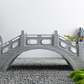 Stone Arch Landscape Bridge With Openwork Railings Rockery Green Plants And Gravel Ground
