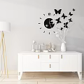 Modern White Entryway Console Table With Drawers Decorative Vase Floor Lamp And Butterfly Wall Clock