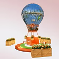 Blue Inflatable Hot Air Balloon Featuring Orange Frame Circular Platform Central Logo and Wooden Planters