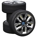 Car Tires Stacked With Silver Multi Spoke Alloy Wheel Rims And Modern Design