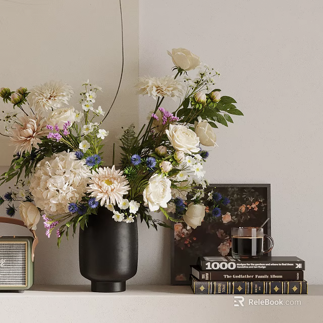 Beautiful Flower Arrangement In Black Vase With Books And Photo Frame 3d model 