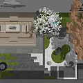 Rockery Stones In Modern Courtyard Garden With White Flower Tree And Stone Path