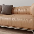 Tan Leather Two Seater Sofa with Accent Pillows on Light Wooden Floor Modern Decor