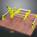 Adjustable Yellow Tool Device With Metal Brackets Connecting Rods And Handheld Tool On Wooden Platform
