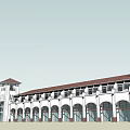 Modern Commercial Street With White Buildings Red Roofs Arched Storefronts And Towers
