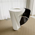 Modern Black and White Washbasin with Unique Shape on Herringbone Wooden Floor