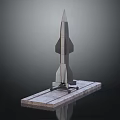 Detailed Metallic Model Rocket Display On Stone Platform With Dark Background