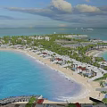 Aerial Planning of Coastal Beachfront Area with White Buildings and Palm Trees