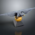 Eagle Sculpture With Spread Wings Clutching Yellow Sphere On Black Pyramid Base