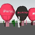 Giant Red And Black Balloons With Barbie Black And Summer Designs Surrounded By Cactus Decorations
