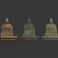 Three Ornate Seated Buddha Statues With Different Color Tones On Lotus Bases