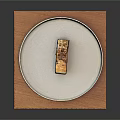 Layered Dessert On White Plate With Wooden Mat And Crunchy Topping