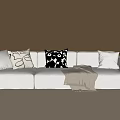 White Three Seater Sofa With Patterned Cushions And Blanket In Modern Interior 3d model