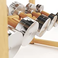Wooden Two Tiered Rack With Silver Circular Objects Arranged On White Background