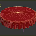 Round Dining Table With Red Tablecloth Pleated Edges And Metal Legs On Dark Background