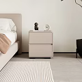 Modern Double Bed With Light Colored Bedding Bedside Table Lamp Round Decor And Green Plant