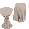 Elegant Round Tables with Ivory Tablecloths Different Heights and Flowy Pleated Design