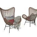 Stylish Rattan Leisure Chair With Black Metal Legs And Decorative Pillows Blanket