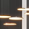 Modern Minimalist Pendant Lights With Circular Design Illuminated On Dark Striped Wall