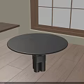 Round Black Dining Table With Unique Base On Wooden Floor Near Window 3d model