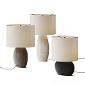 Three Modern Table Lamps with Different Colored Wooden Bases and Cream Linen Shades