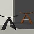 Modern Black And Brown Stools With Crossed Legs On Display Platform 3d model