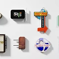 Assorted Decorative Ornament Set With Various Design Elements Like Signs Badges And Home Decor Pieces