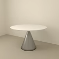 Modern Dining Table With White Round Tabletop And Conical Silver Metal Base In Beige Background