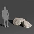Silhouette Figure Standing Next to Two Large Natural Stone Boulders in Gray Background