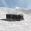 Small Black Cabin On Raised Platform With Antenna Lights In Snowy Landscape