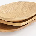 Wooden Tableware Set with Three Oval Plates and Natural Wood Grain Design
