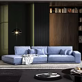Blue Sectional Sofa with Plush Cushions and Throw Blanket in Modern Living Space